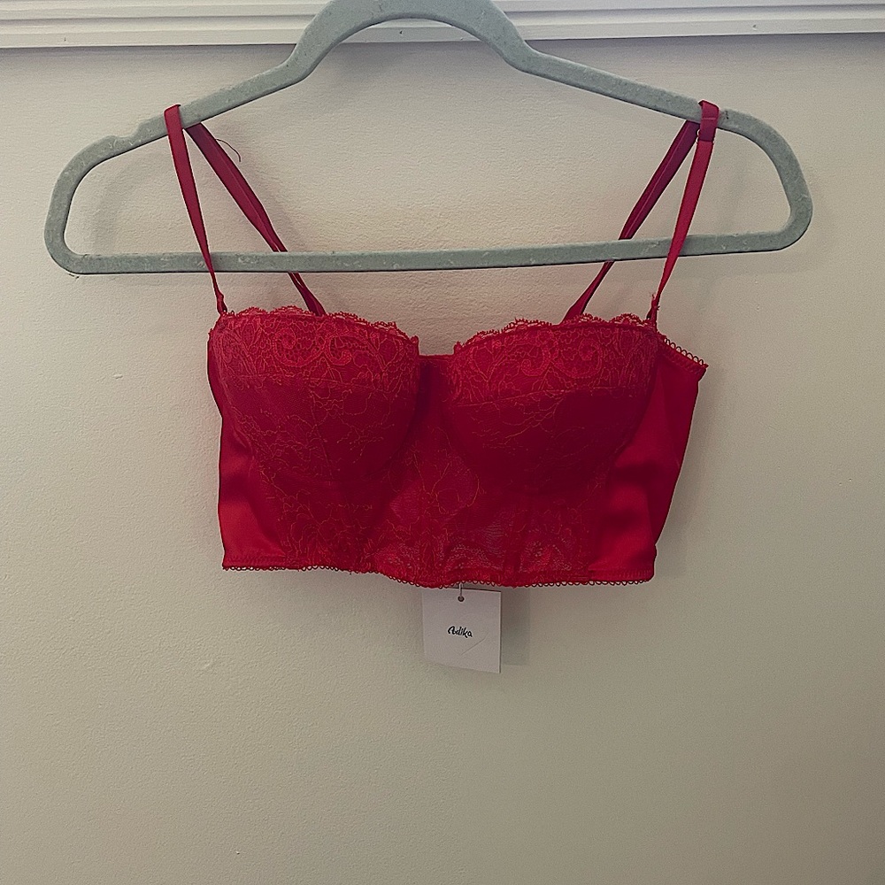 Red cropped corset from Adika. Size Medium.